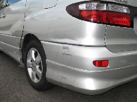 自動車保険を使った修理の修理事例：左側スライドドア〜クォータ、リヤバンパー損傷