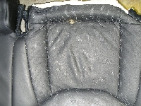 シート・内装の修理事例：レザーシート　タバコの焦げ穴リペア